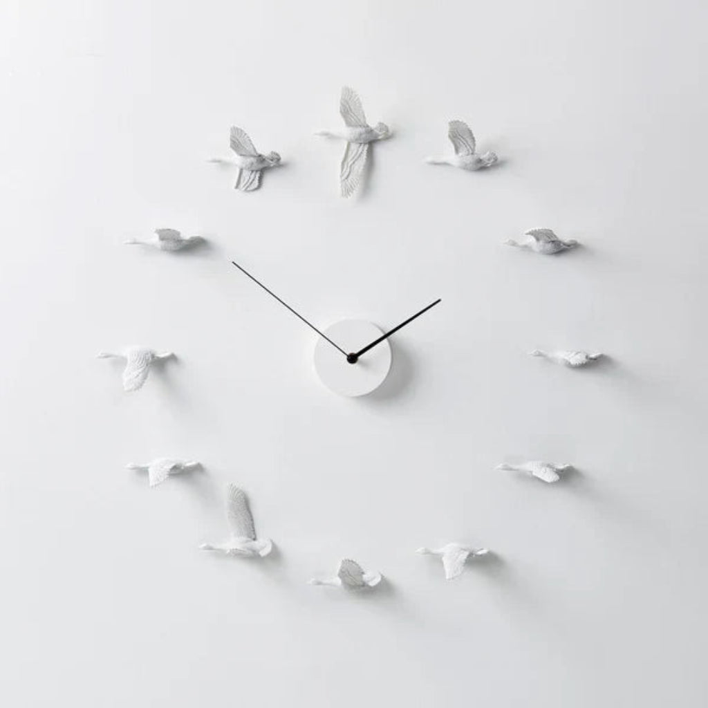 Clock Haoshi Migrantbird X - O Form available at Spacio retail stores in Mumbaii & Kolkata and online.