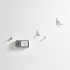 Haoshi Sparrow Clock in Dark Grey color on a white back ground available at Spacio India for modern and luxury interiors from our Timepieces and clocks collection. available at Spacio retail stores in Mumbaii & Kolkata and online.