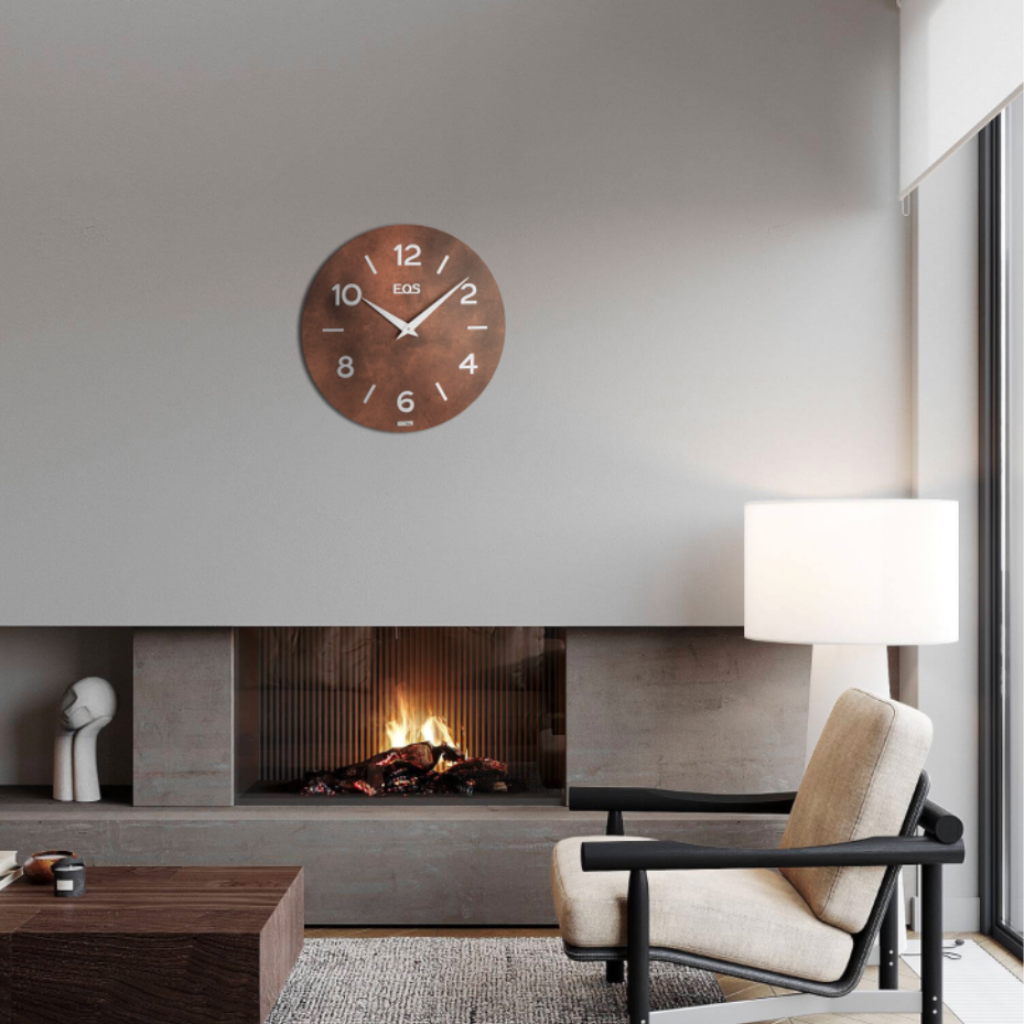 Modern living room with a fireplace, chair, and wooden clock on the wall.