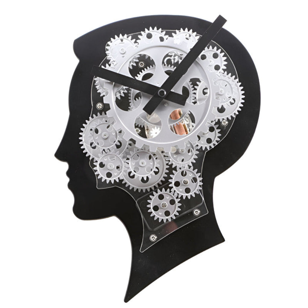 Wall clock with gear design inside a silhouette of a head on a white background from Kairos available at Spacio retail stores in Mumbaii & Kolkata and online.