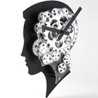 Wall clock designed like a human head with gears inside on a white background