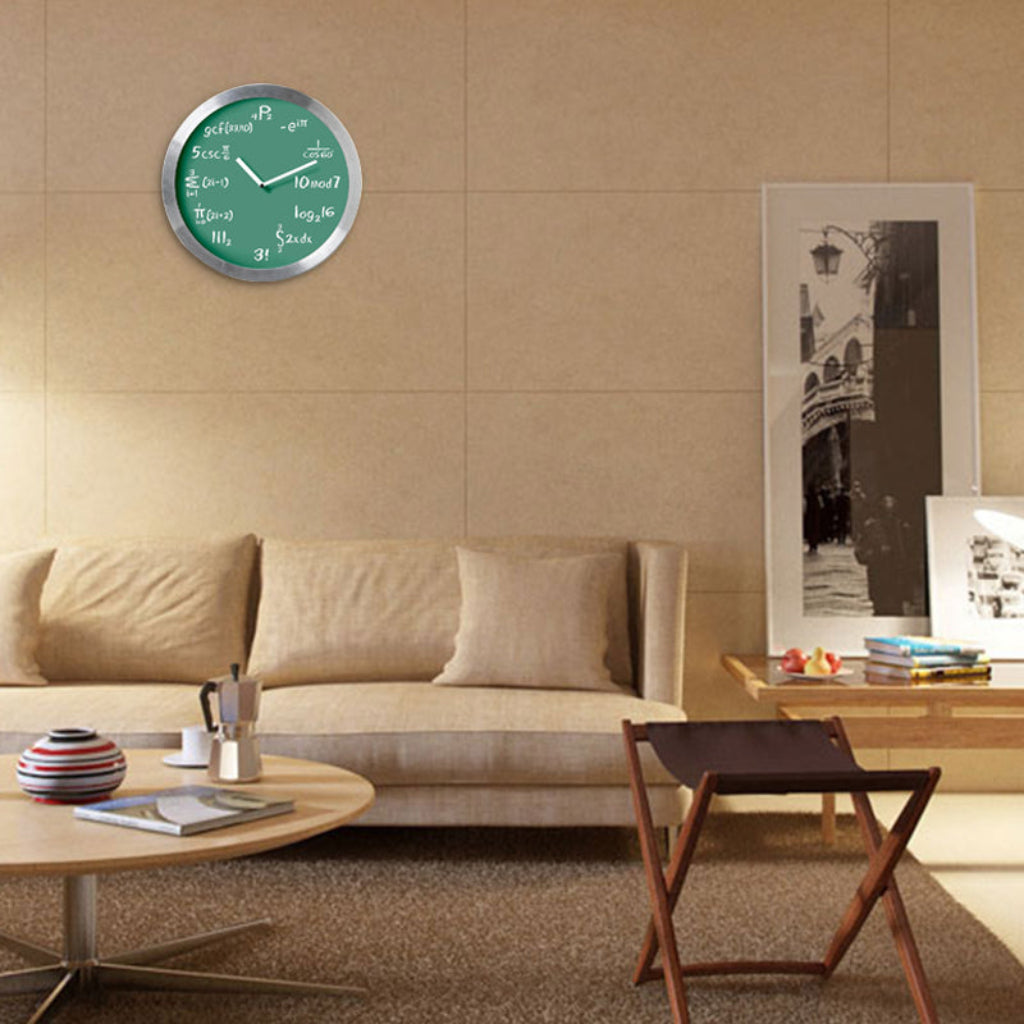 Living room with a beige sofa, round coffee table, and wall clock displaying a green face.