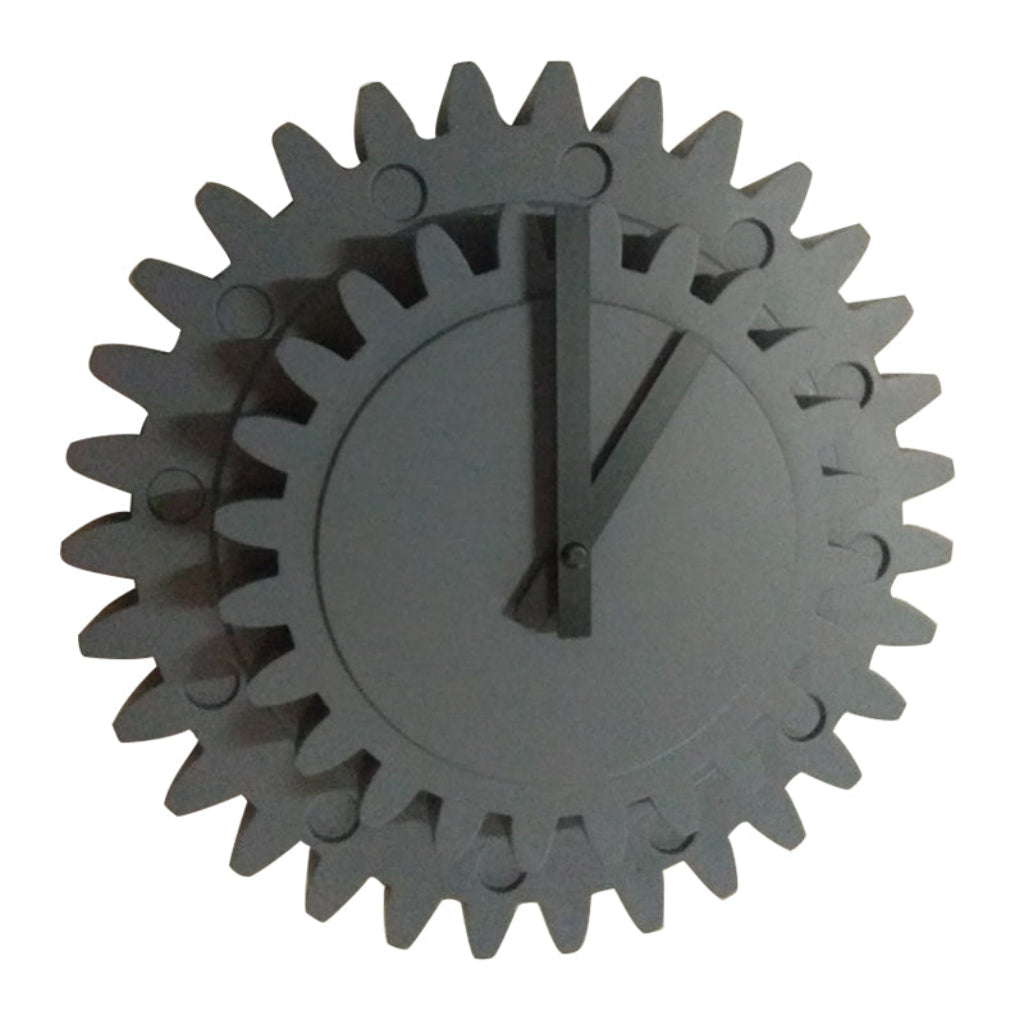 Gray gear-shaped wall clock on a white background available at Spacio retail stores in Mumbaii & Kolkata and online.