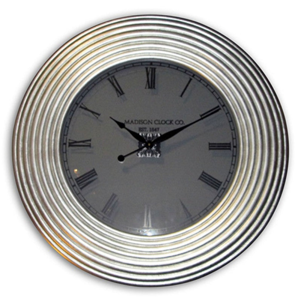 Wall clock with silver metallic rim and black face on a white  from Kairos available at Spacio retail stores in Mumbaii & Kolkata and online.background