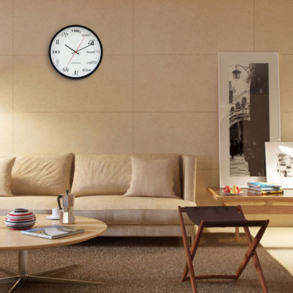 Living room with beige sofa, round coffee table, and wall clock displaying mathematical equations.
