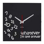 Black wall clock with white text 'whatever I'm late anyway' on a black background from Kairos available at Spacio retail stores in Mumbaii & Kolkata and online.