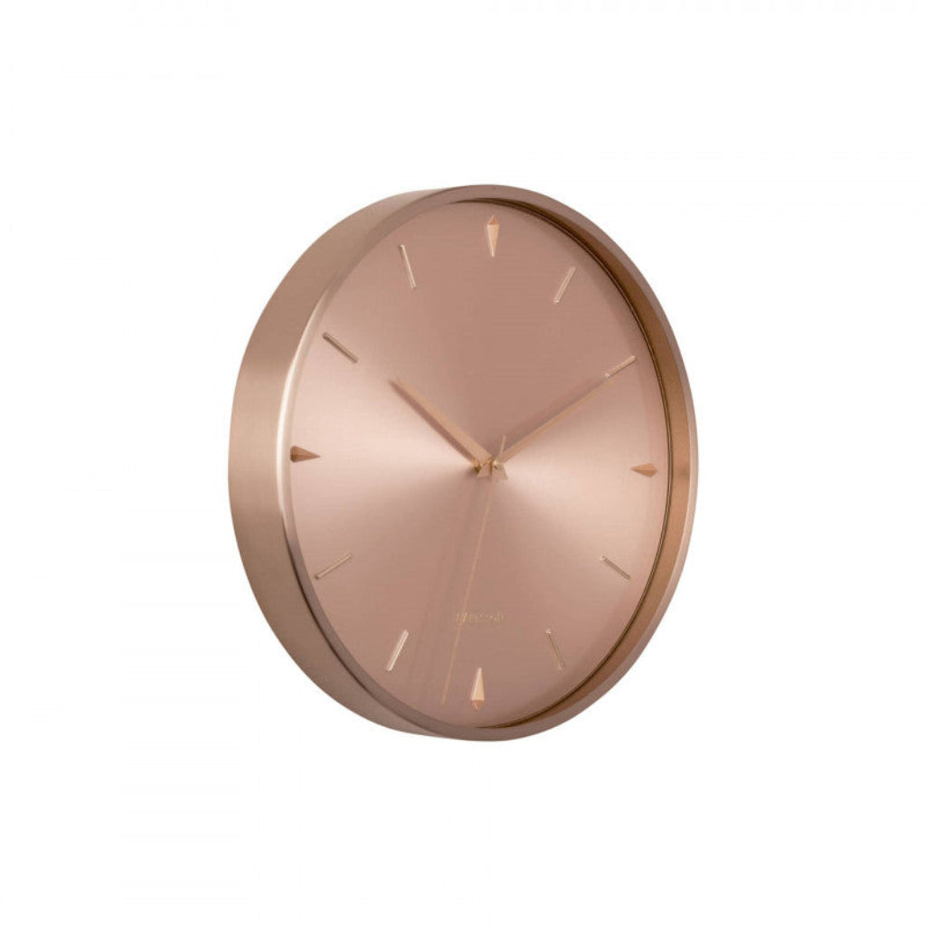 Rose gold wall clock on a white background