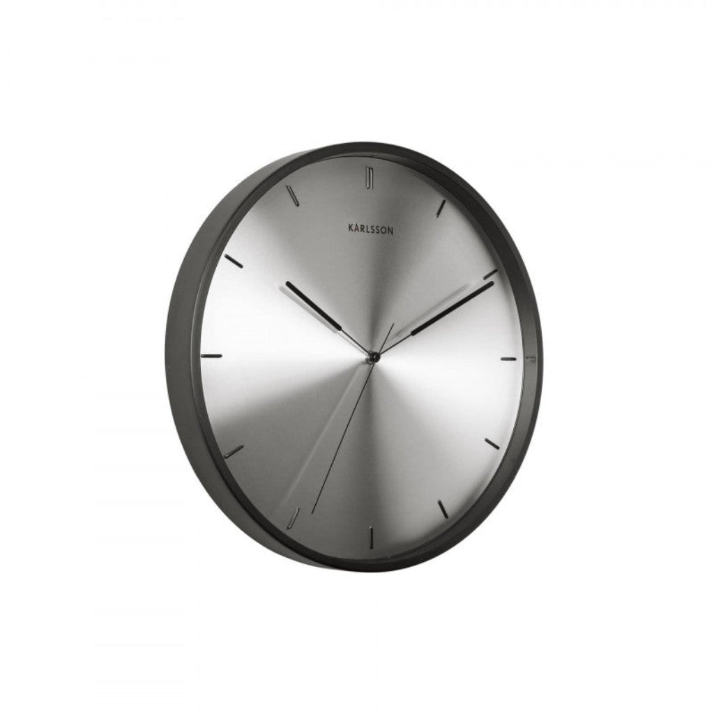 Silver wall clock with black rim on a white background
