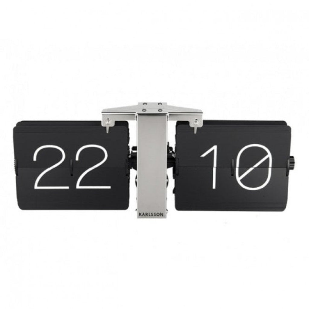 Flip clock with black face and white numbers displaying '22' and '10', brand 'KARLSSON' visible. available at Spacio retail stores in Mumbaii & Kolkata and online.