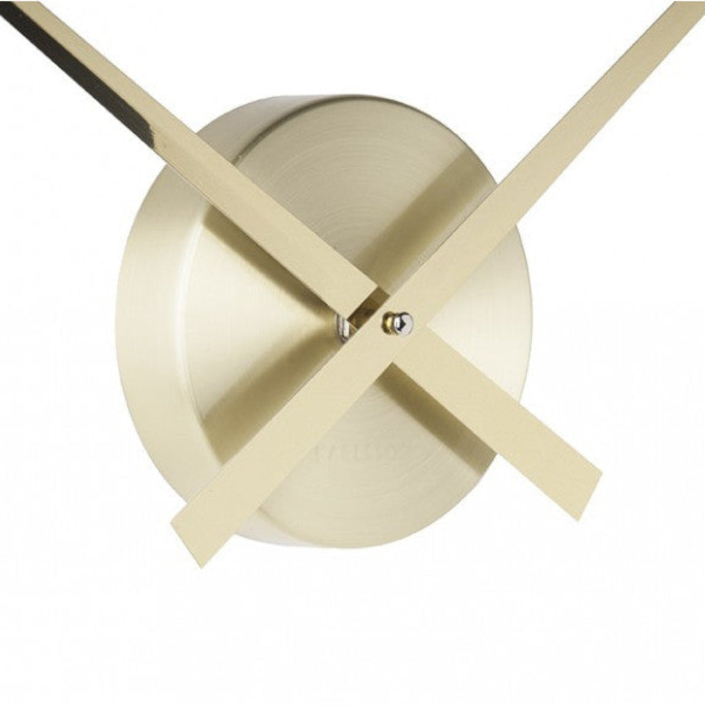 Gold clock mechanism on a white background