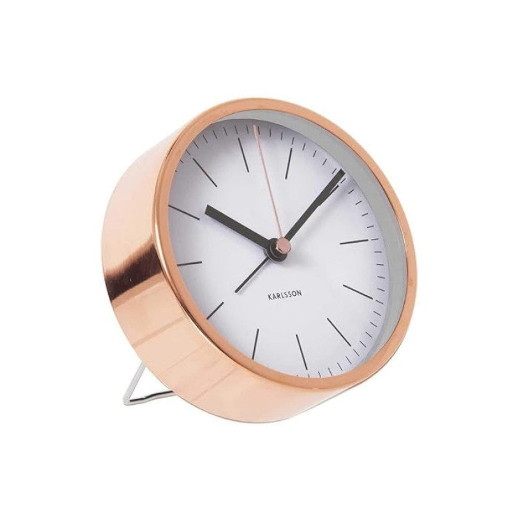 Rose gold alarm clock with white face on a white background from Karlsson available at Spacio retail stores in Mumbaii & Kolkata and online.