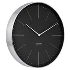 Black wall clock with silver frame on a white background