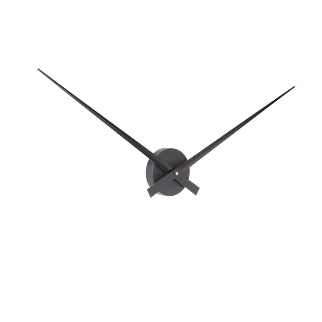 Black wall clock with long thin hands on a white background
