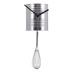 Metal can-shaped clock with a whisk on a white background available at Spacio retail stores in Mumbaii & Kolkata and online.