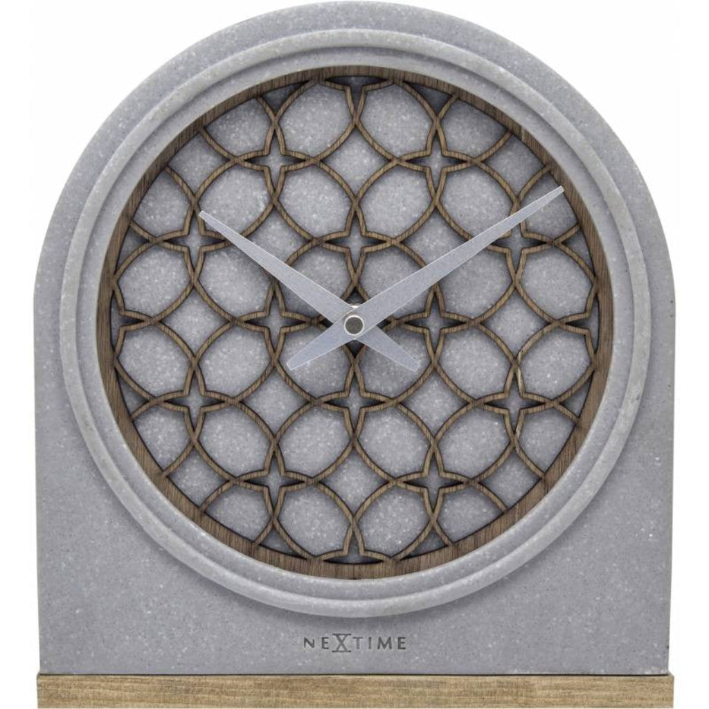 Decorative clock with geometric design on a white background from Nextime available at Spacio retail stores in Mumbaii & Kolkata and online.