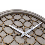 Decorative wall clock with geometric pattern on a white background