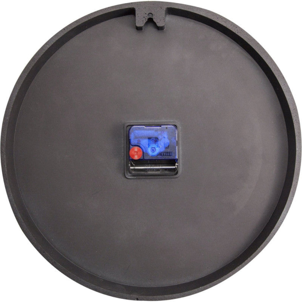 Black round object with a small electronic component on a white background