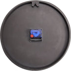 Black round object with a small electronic component on a white background