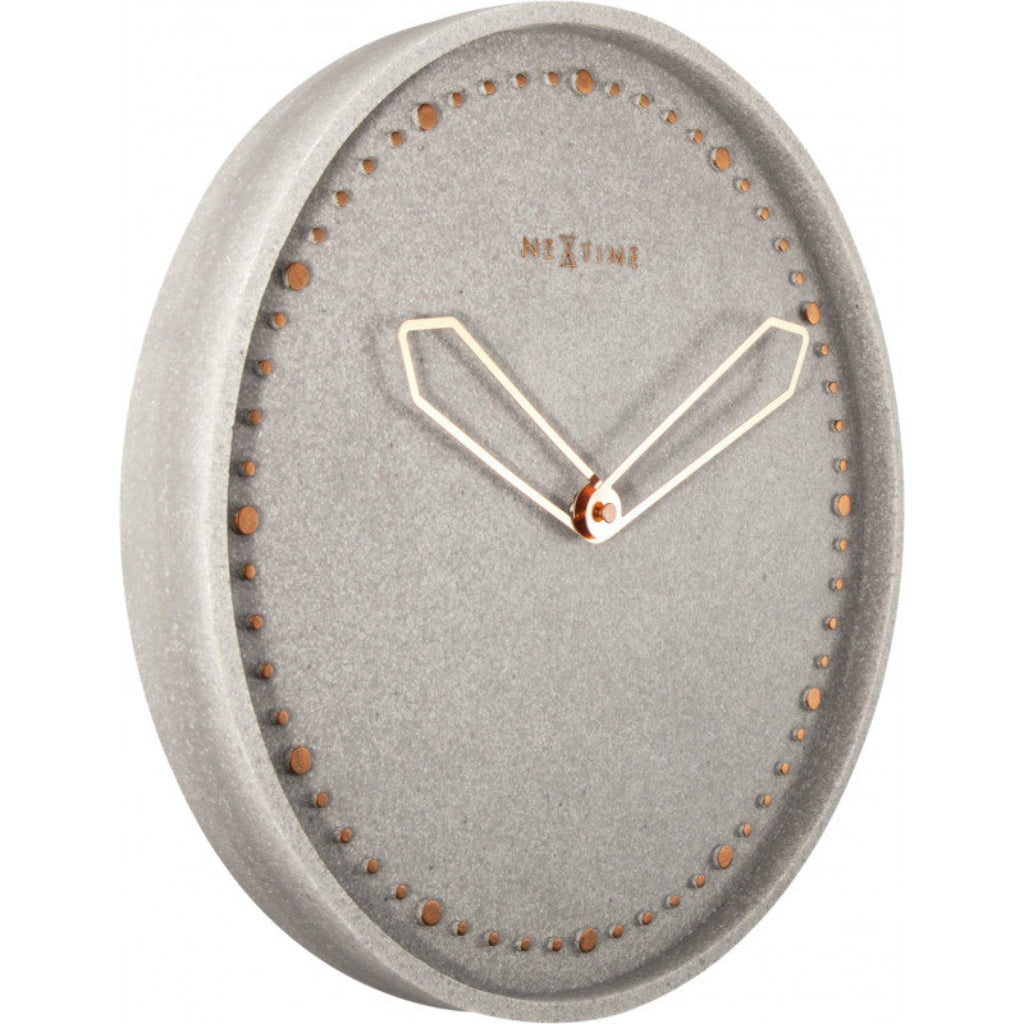 Gray wall clock with gold accents on a white background