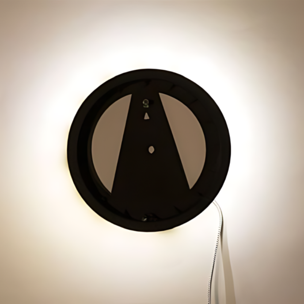 Round wall light fixture with control buttons on a beige wall