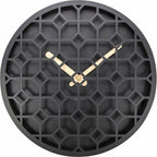 Black wall clock with geometric design and gold hands on a white background from Nextime available at Spacio retail stores in Mumbaii & Kolkata and online.
