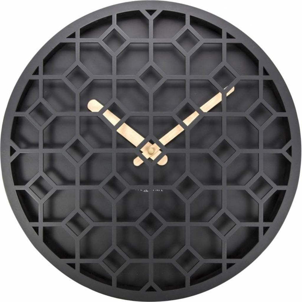 Black wall clock with geometric design and gold hands on a white background from Nextime available at Spacio retail stores in Mumbaii & Kolkata and online.