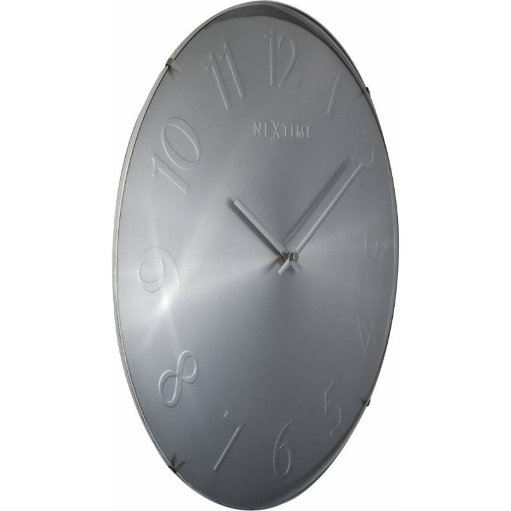 Gray wall clock with Roman numerals on a white background