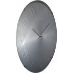 Gray wall clock with Roman numerals on a white background