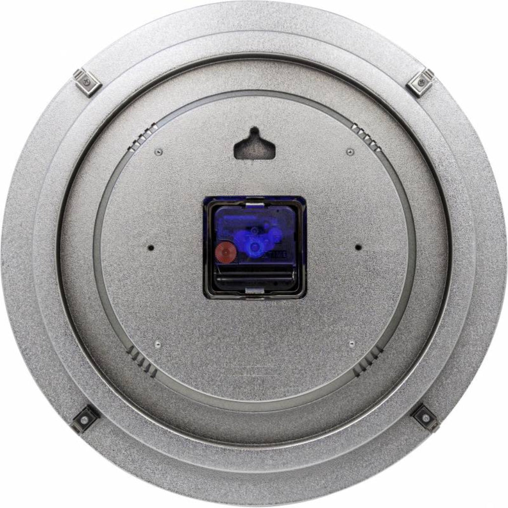 Round metallic object with a central blue and red component on a white background