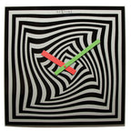 NeXtime wall clock with black, white, and red design on a white background from Nextime available at Spacio retail stores in Mumbaii & Kolkata and online.