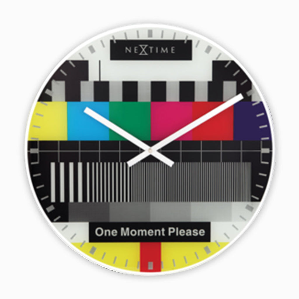 Wall clock with TV test pattern design and 'NeXtime' branding from Nextime available at Spacio retail stores in Mumbaii & Kolkata and online.