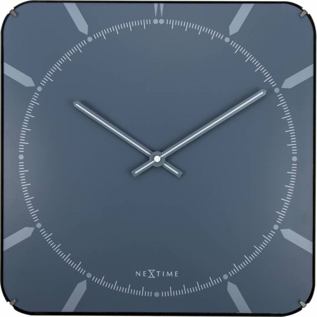 Blue square wall clock with silver hands and 'NeXtime' branding. from Nextime available at Spacio retail stores in Mumbaii & Kolkata and online.