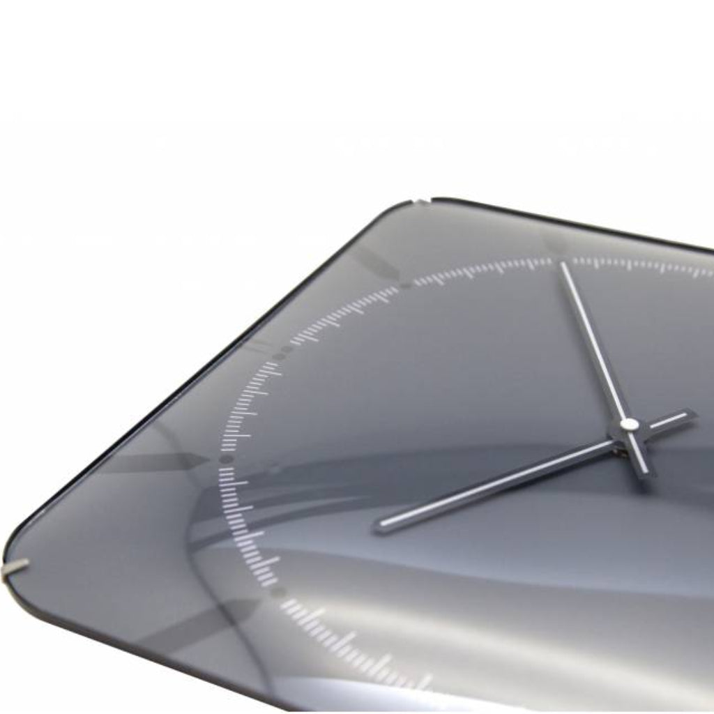 Modern wall clock with a sleek design on a white background