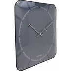 Gray wall clock with white hands on a white background