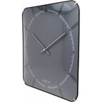 Gray wall clock with a modern design on a white background