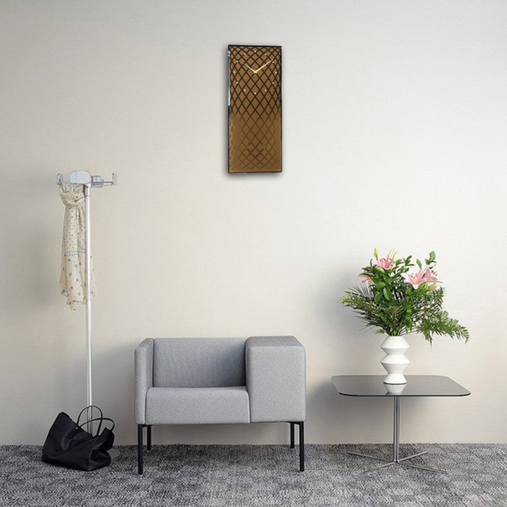 Modern living room with a gray sofa, coat rack, and decorative elements.