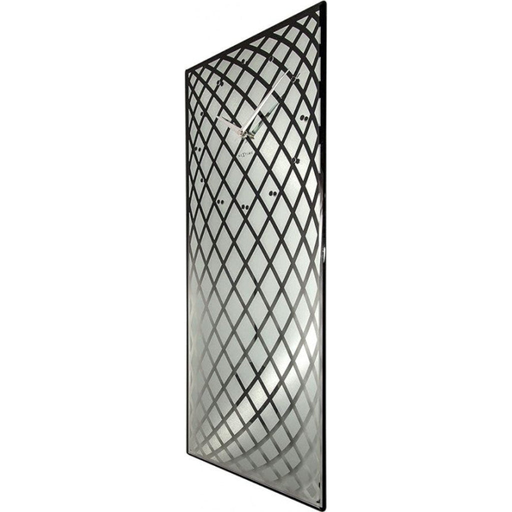 Decorative metal screen with lattice design on a white background