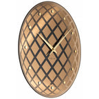 Decorative wall clock with geometric pattern and gold accents on a white background