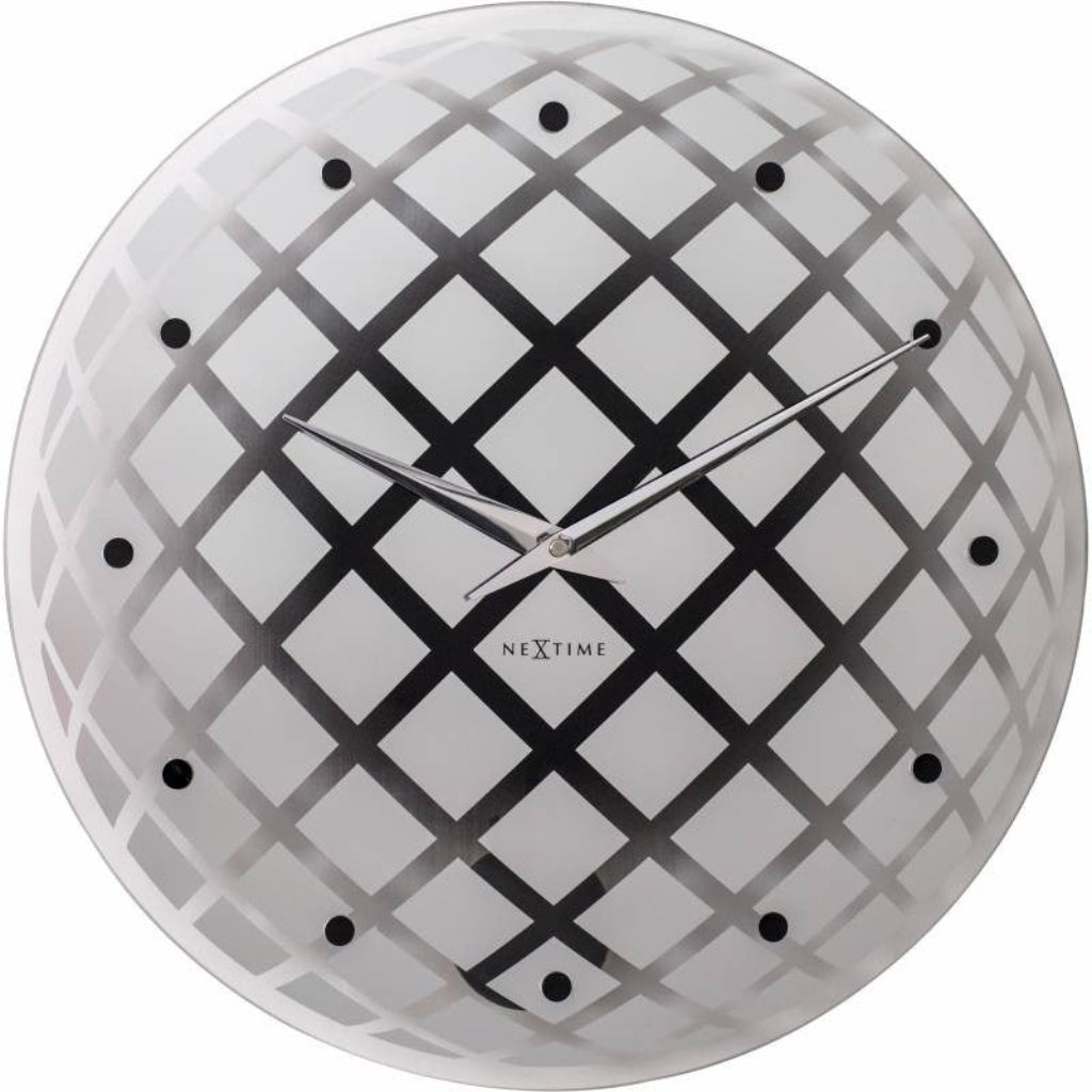 Wall clock with black grid pattern on a white background, branded 'NeXtime'. from Nextime available at Spacio retail stores in Mumbaii & Kolkata and online.