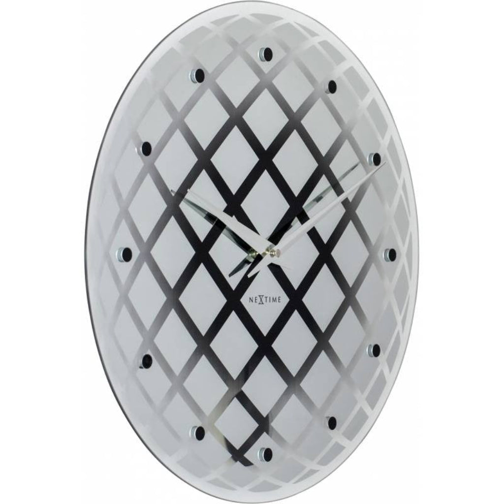 Wall clock with geometric design on a white background
