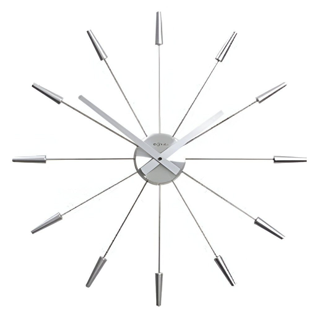 Modern wall clock with metallic design on a white background from Nextime available at Spacio retail stores in Mumbaii & Kolkata and online.