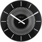 Black wall clock with white hands and 'NeXtime' branding on a white background from Nextime available at Spacio retail stores in Mumbaii & Kolkata and online.