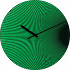 Green wall clock with black hour and minute hands on a white background