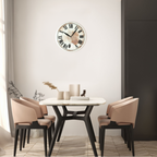 Dining room with a round table and chairs, featuring a decorative wall clock.