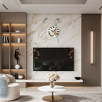 Modern living room with marble wall, TV, and decorative elements.