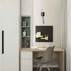 Small home office with a desk, chair, shelves, and wall-mounted clock.