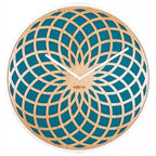 Geometric wall clock with blue and beige design on a white background from Nextime available at Spacio retail stores in Mumbaii & Kolkata and online.