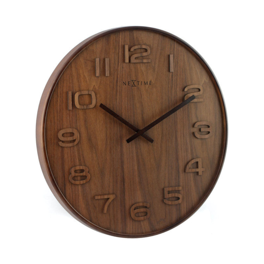 Wooden wall clock with black hands on a white background from Nextime available at Spacio retail stores in Mumbaii & Kolkata and online.