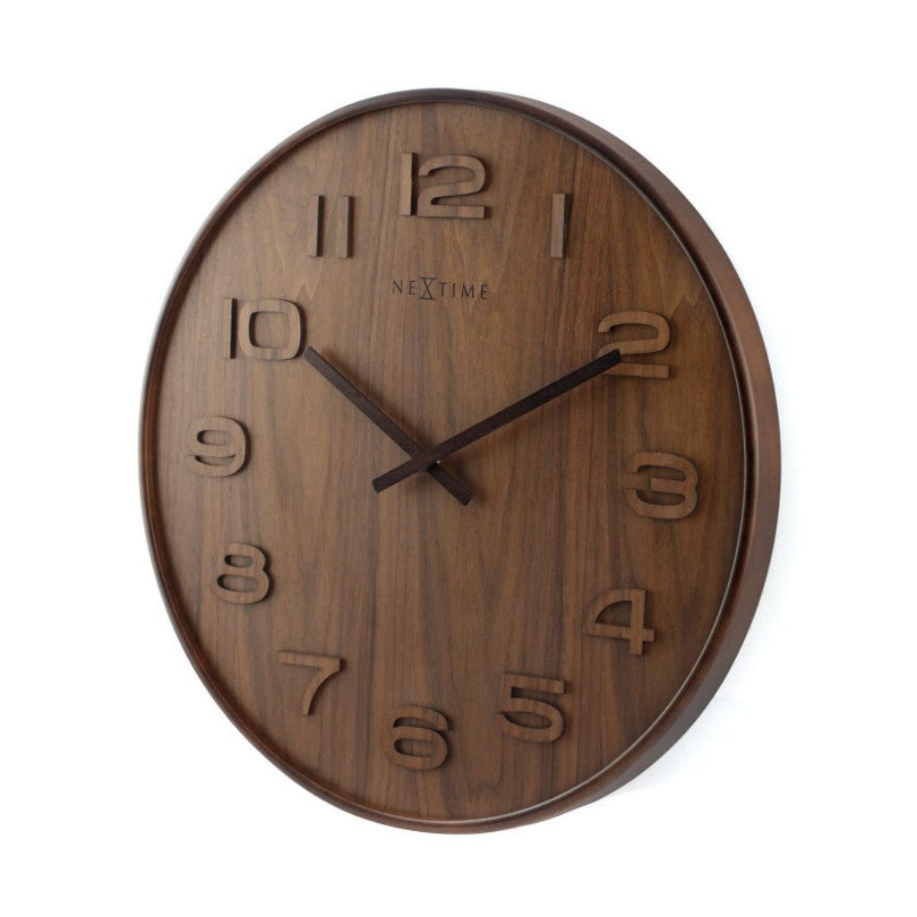 Wooden wall clock with brand name on a white background