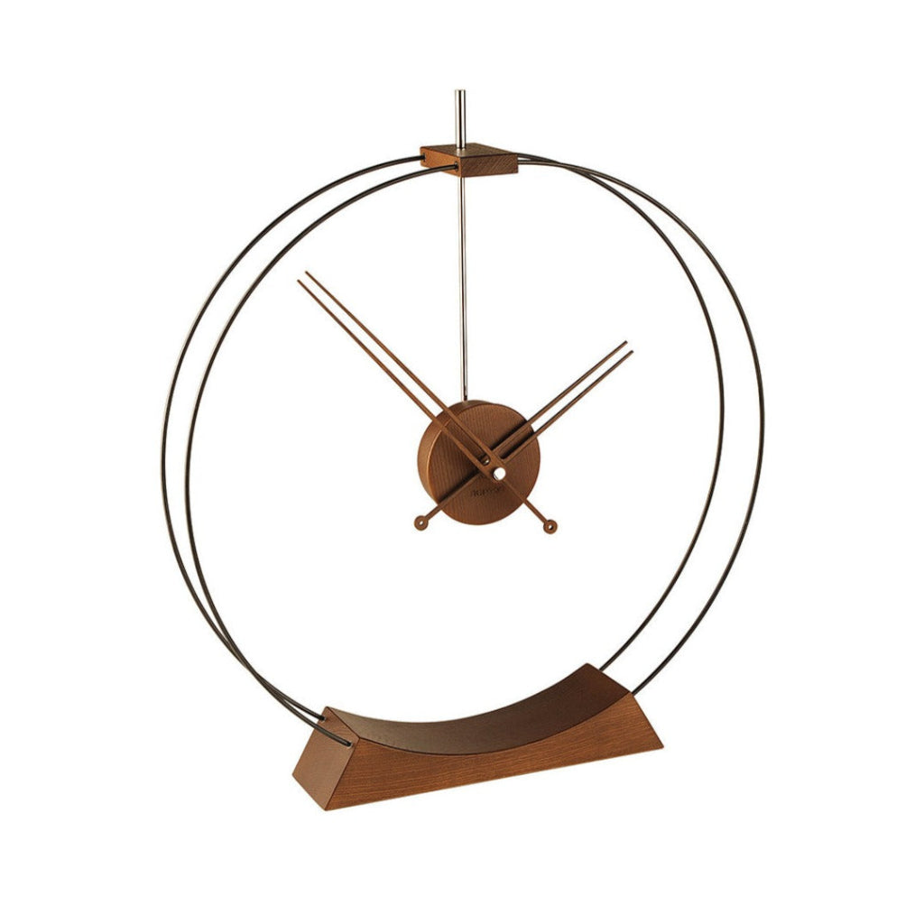 A Nomon Aire AIR circular ring wooden clock on a wooden stand. available at Spacio retail stores in Mumbaii & Kolkata and online.